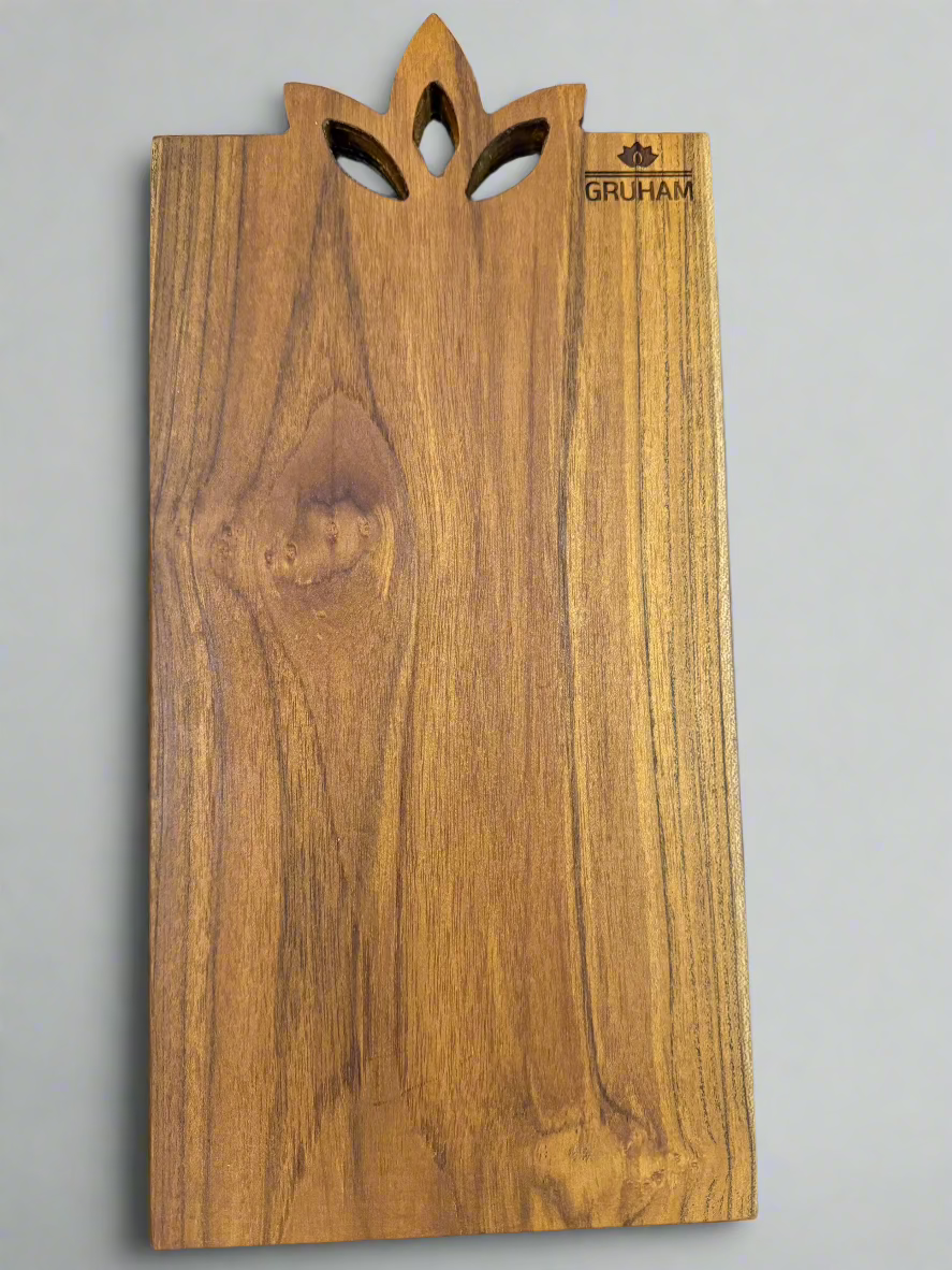 Lotus-inspired wooden handle carved into single-piece GRUHAM teak cutting board